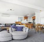 Penguin Cove relax on the beach - Foster Accommodation