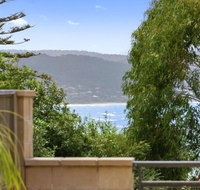APARTMENT 23 PACIFIC APARTMENTS sit on the deck  soak in the view - Foster Accommodation