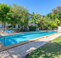 Baden 42 Rainbow Shores Ground floor unit air conditioned overlooking outdoor spa - Foster Accommodation