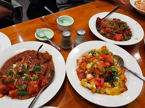Aman Indian Restaurant - Foster Accommodation 0