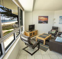 Oceanside Resort - Absolute Beachfront Apartments - Foster Accommodation