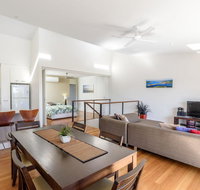 Unit 4 Rainbow Surf - Modern double storey townhouse with large shared pool close to beach and shop - Foster Accommodation