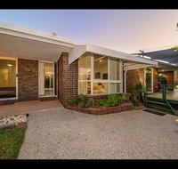 Woorim Secluded Palms Cottage - Foster Accommodation